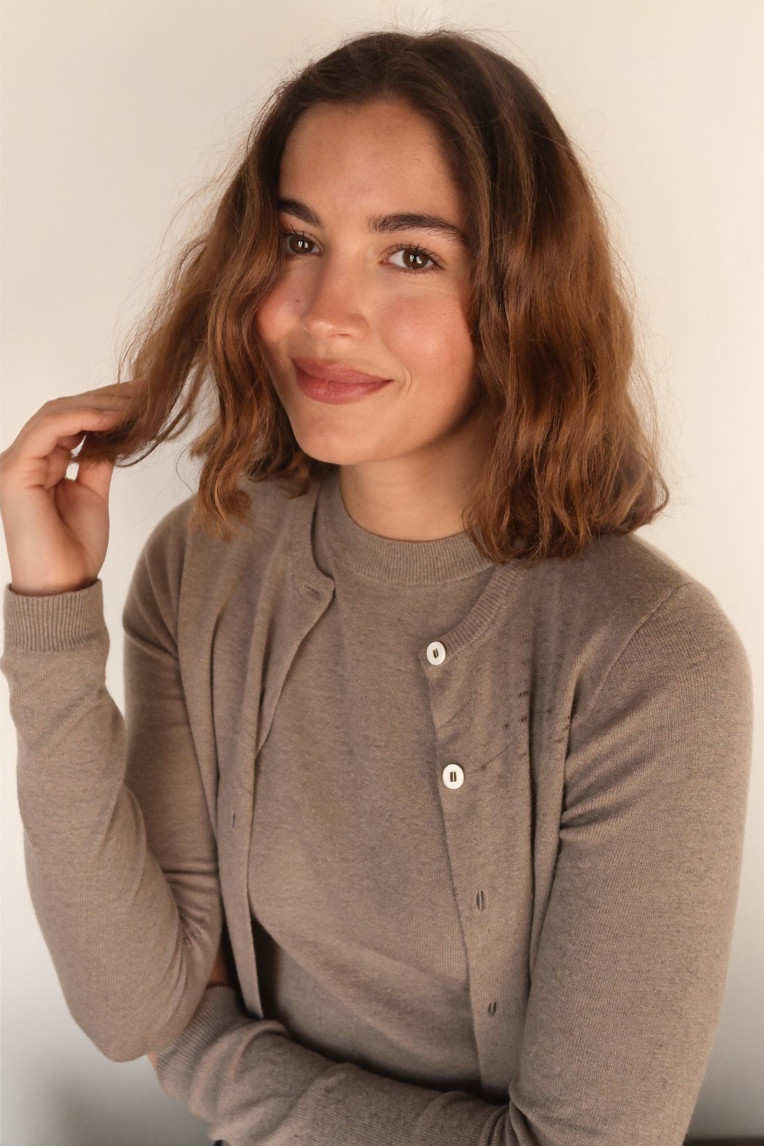 A woman wearing a natural-looking Ralph wig