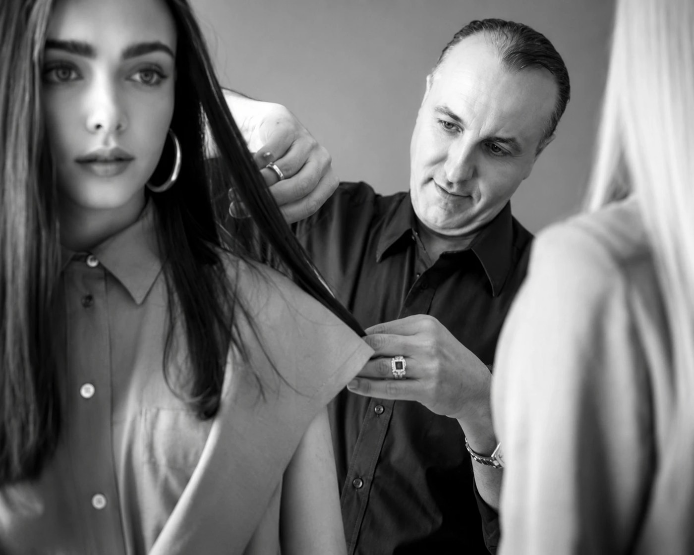 Ralph Toledano fitting a wig with a client in the atelier